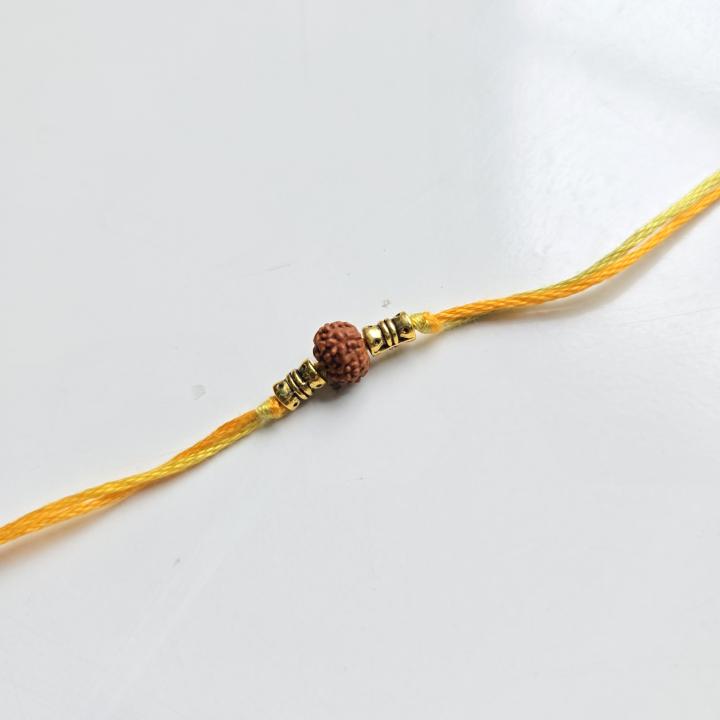 Minimal Yellow Rudraksh Rakhi