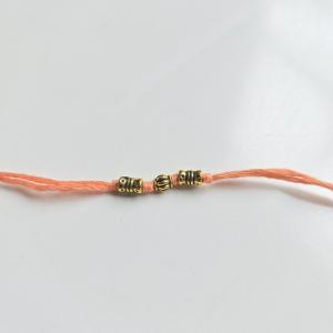 Delicate Peach Rakhi