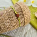 Green and Yellow Rudraksh Rakhi