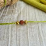 Green and Yellow Rudraksh Rakhi